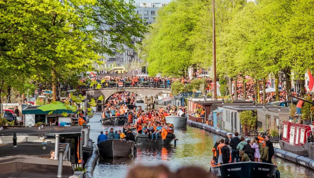 People celebrate King's Day in Amsterdam